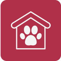 Paw print inside house icon on red background. Paw print inside house icon on red background.